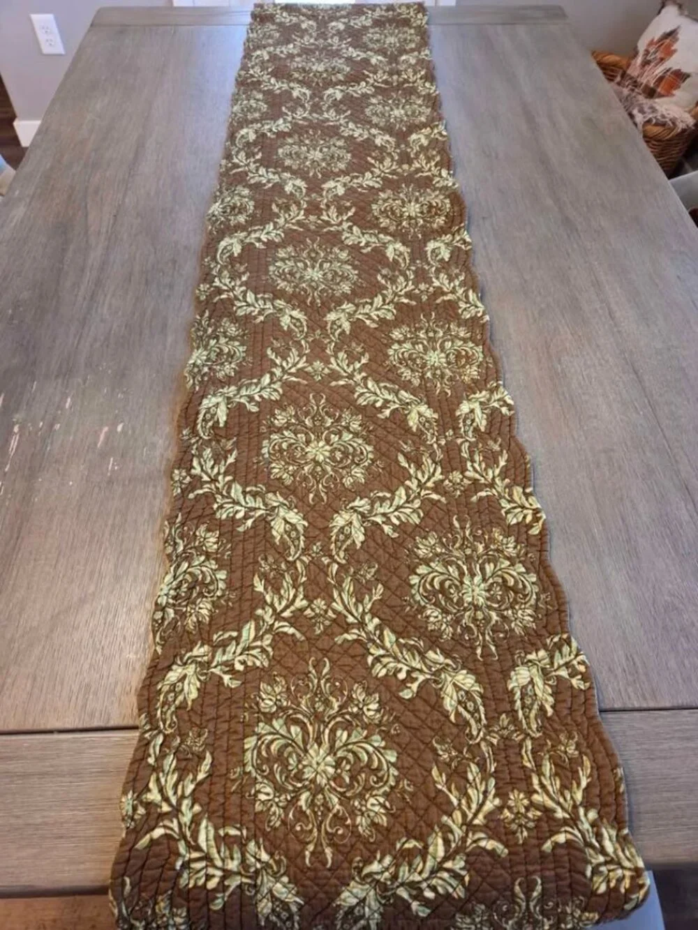 Brown and green quilted table runner